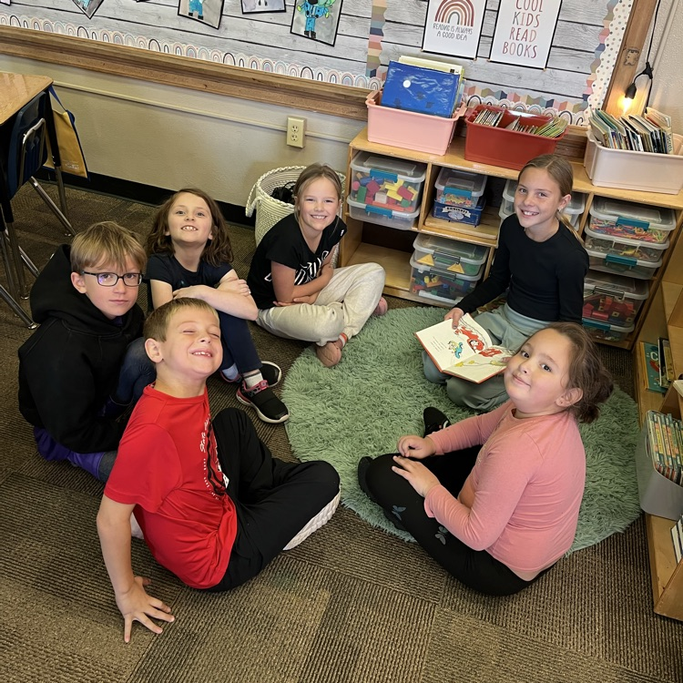 Mrs. Vlasman's Beadle 2nd graders love reading with 5th grade friends.