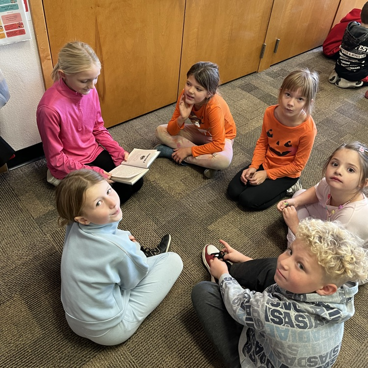 Mrs. Vlasman's Beadle 2nd graders love reading with 5th grade friends.