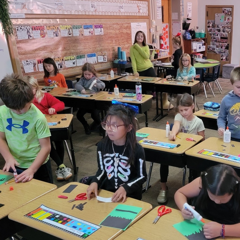 Students making a craft.