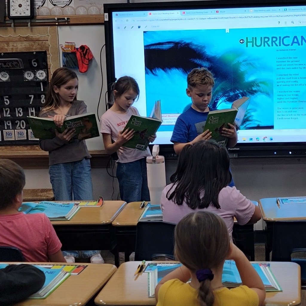 Students practicing reading fluency. 