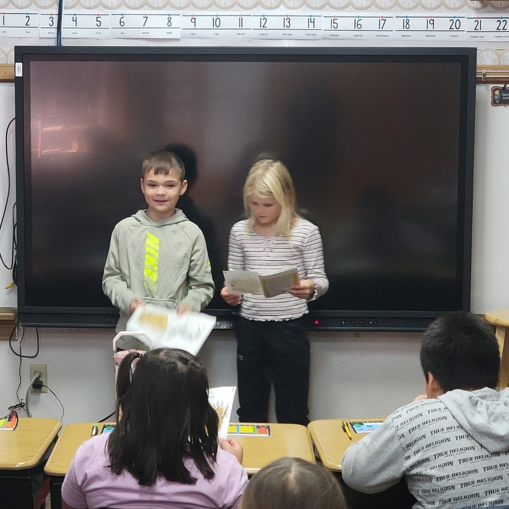 Students practicing reading fluency.