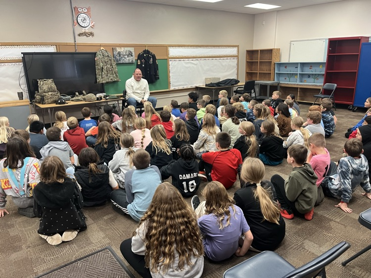 Veteran Schild talking to 5th grade 