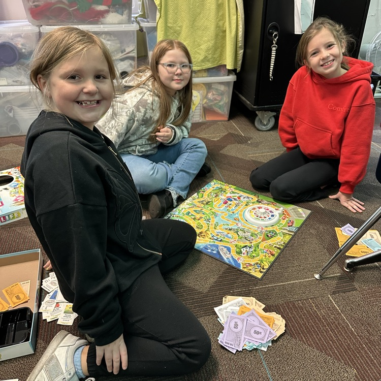 kids playing board and card games 