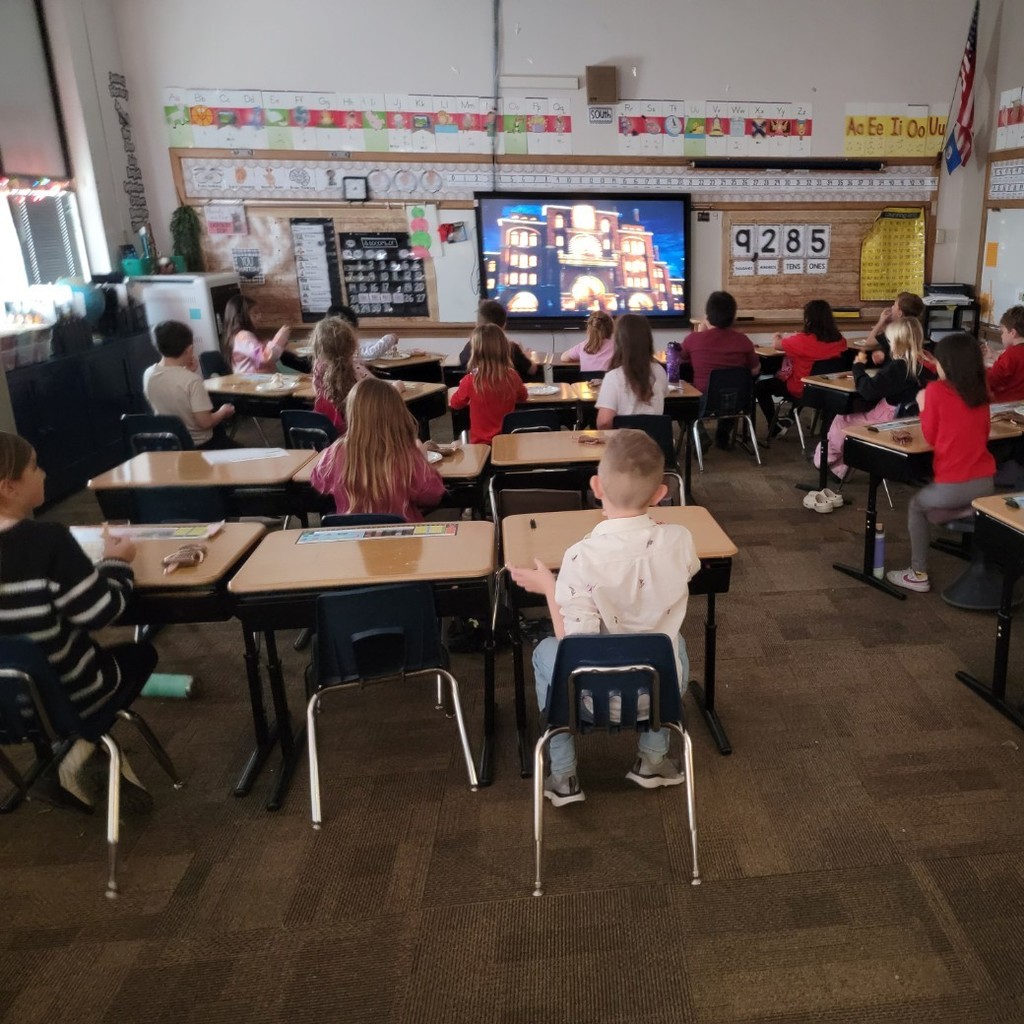 Students watching a movie.