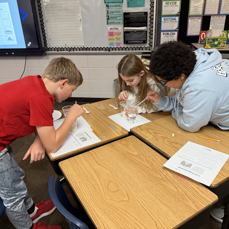 Mrs. Lukkes's fourth grade class at Beadle enjoyed being scientists and learning about volcanoes. They did an experiment to learn the difference between cone volcanoes and shield volcanoes.  