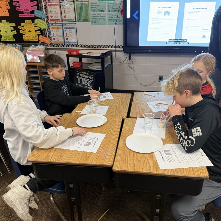 Mrs. Lukkes's fourth grade class at Beadle enjoyed being scientists and learning about volcanoes. They did an experiment to learn the difference between cone volcanoes and shield volcanoes.  