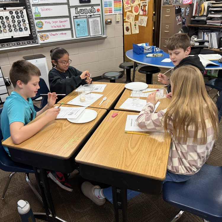 Mrs. Lukkes's fourth grade class at Beadle enjoyed being scientists and learning about volcanoes. They did an experiment to learn the difference between cone volcanoes and shield volcanoes.  