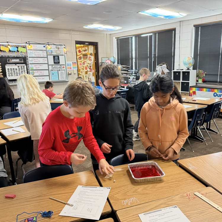 Beadle fourth graders in Mrs. Lukkes's class designed and tested buildings that could withstand an earthquake.  Mr. Mitzel joined one of the groups too! 