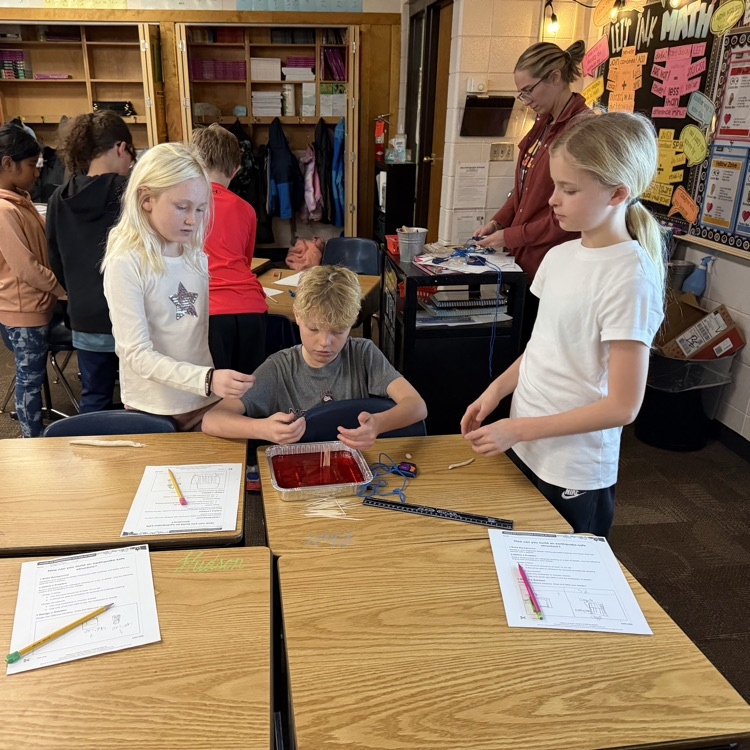 Beadle fourth graders in Mrs. Lukkes's class designed and tested buildings that could withstand an earthquake.  Mr. Mitzel joined one of the groups too! 