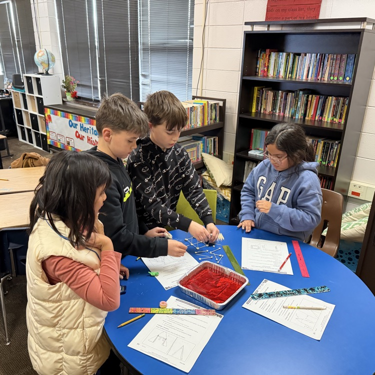 Beadle fourth graders in Mrs. Lukkes's class designed and tested buildings that could withstand an earthquake.  Mr. Mitzel joined one of the groups too! 