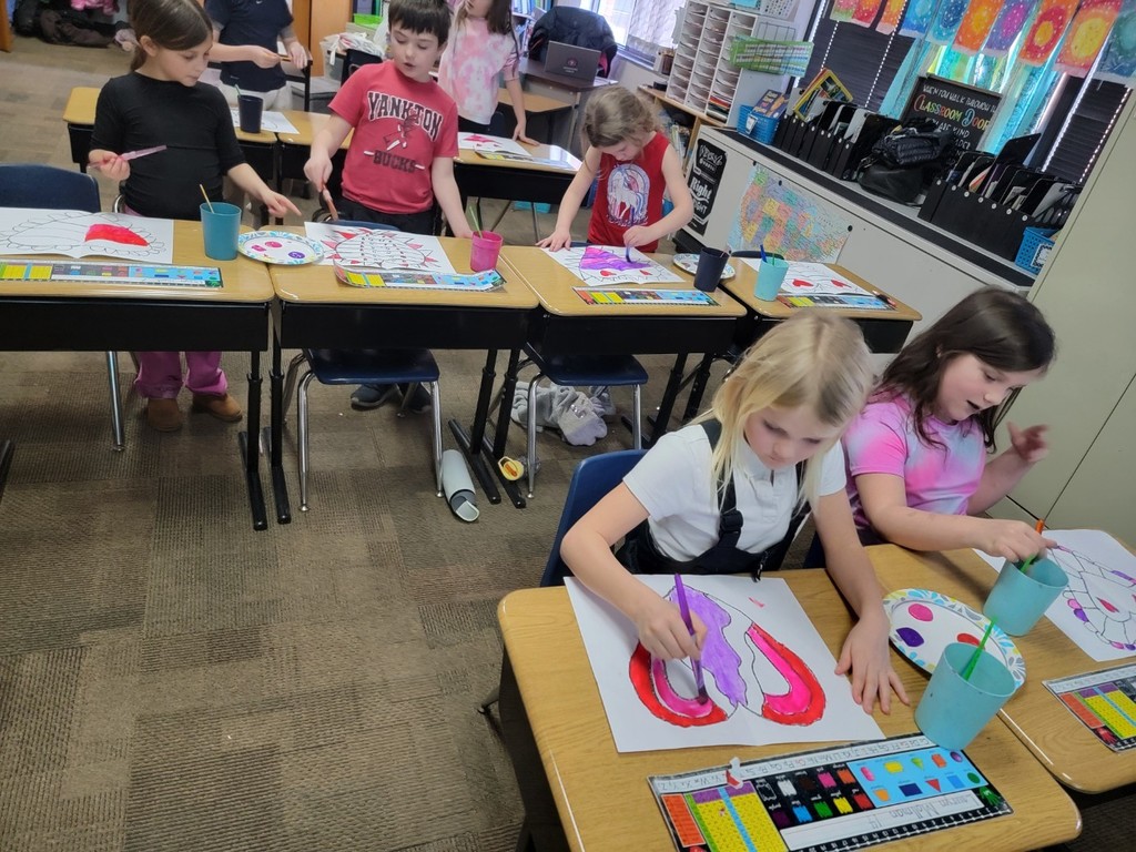 Students painting.