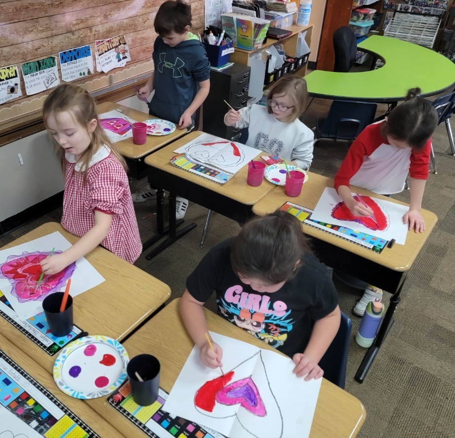 Students painting. 