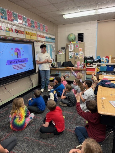 students with teacher for kindness 