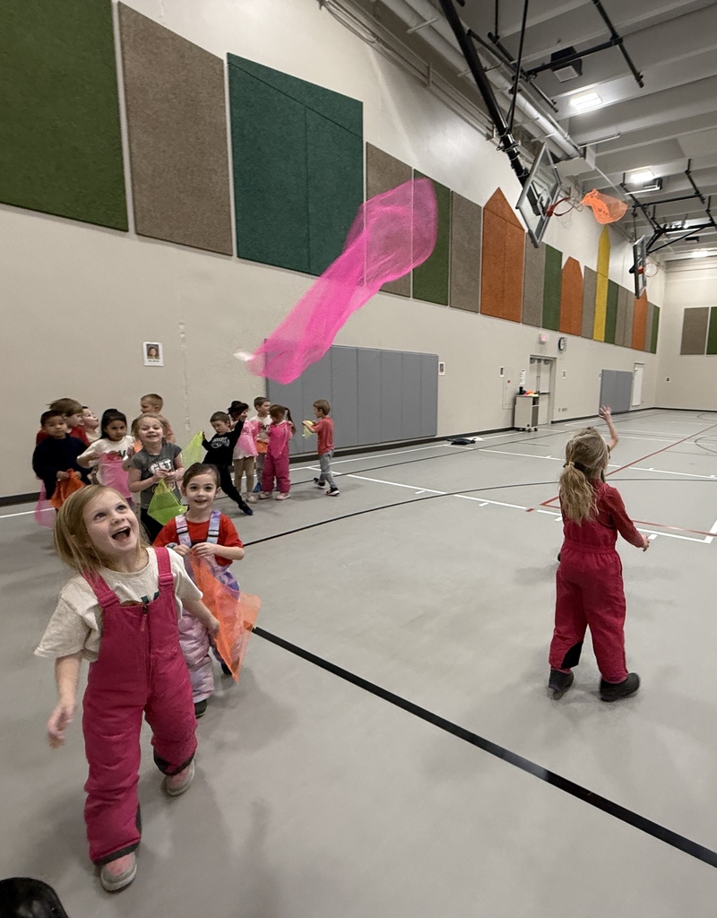 Students catching scarves