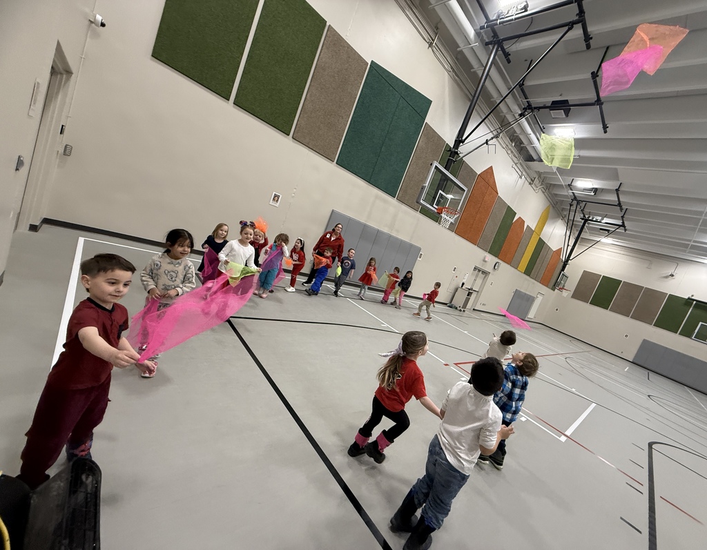 Students catching scarves