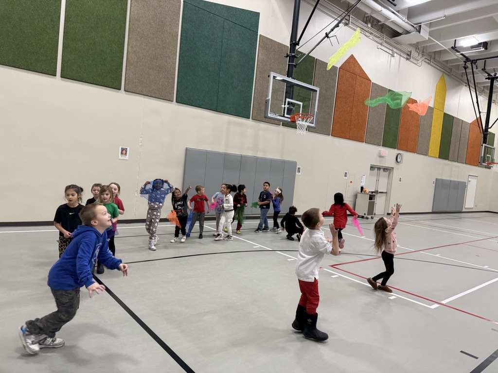 Students catching scarves