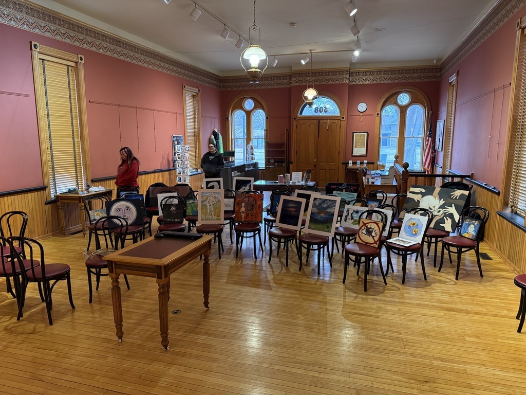 Getting all the artwork ready to hang.