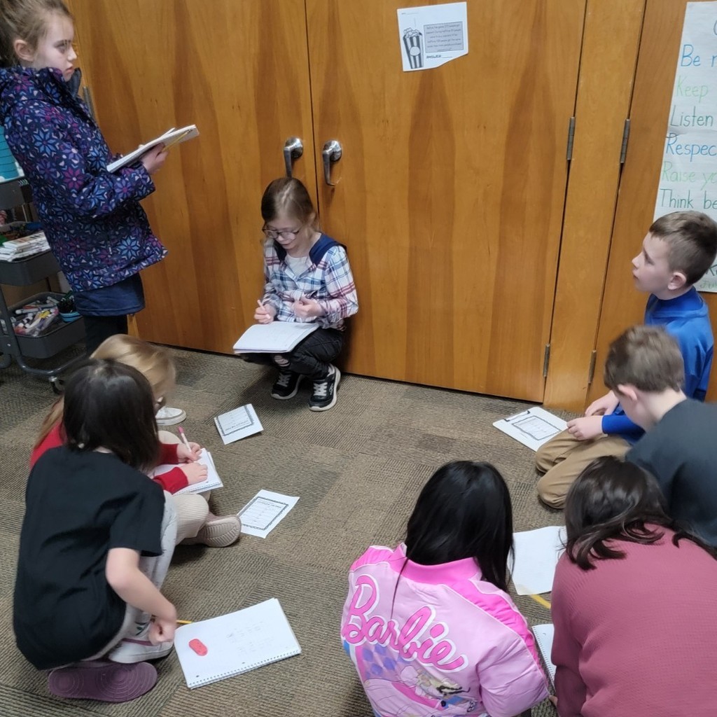 Students practicing math. 