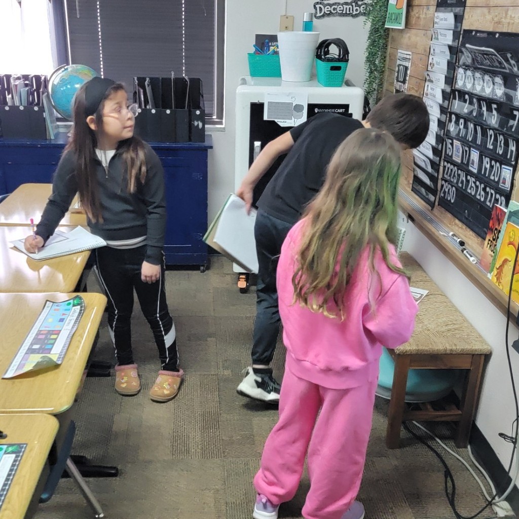 Students practicing math. 