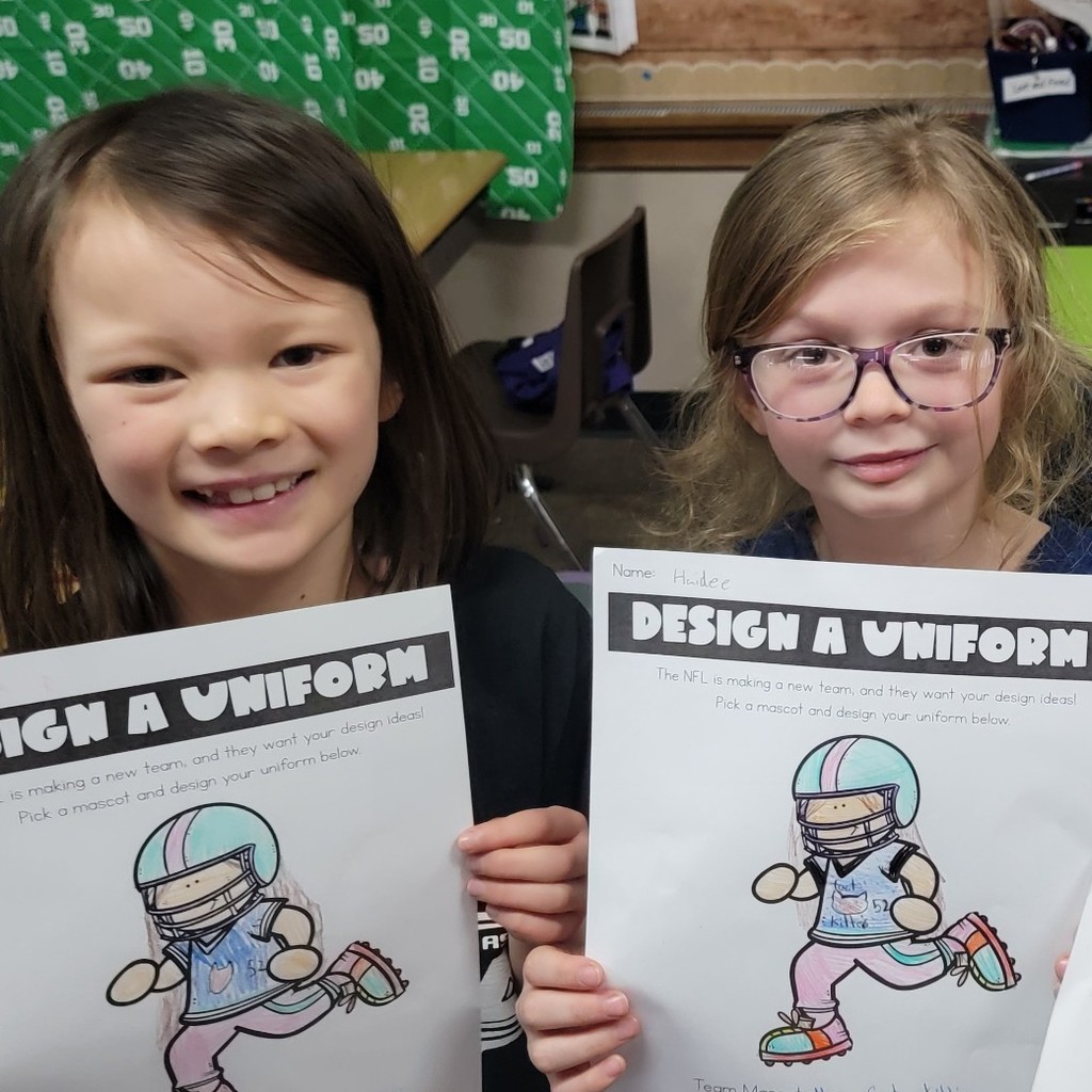 Students designing jerseys. 