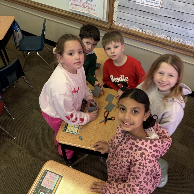 Beadle 2nd Graders in Mrs. Vlasman's class complete the, 'Build a House of Cards' challenge.