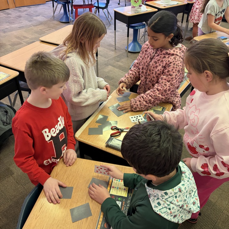 Beadle 2nd Graders in Mrs. Vlasman's class complete the, 'Build a House of Cards' challenge.