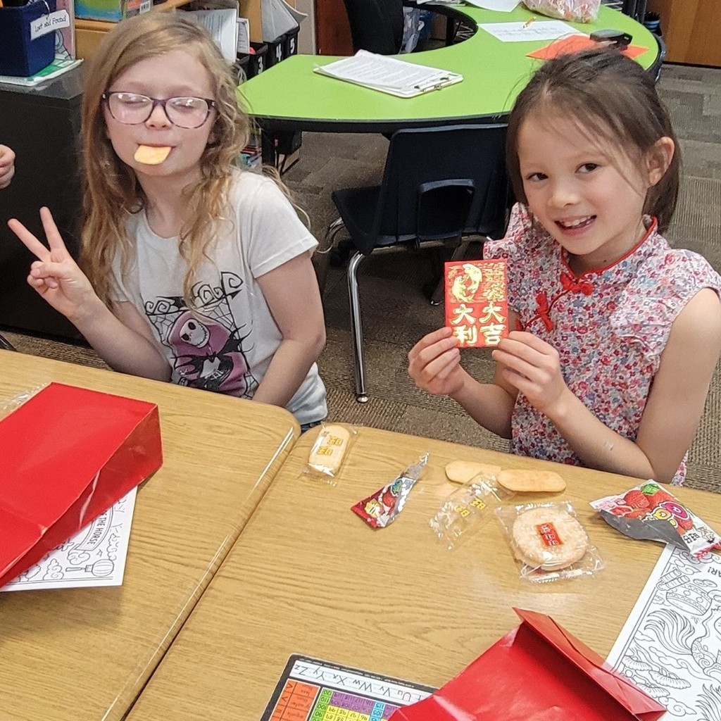Students enjoying Chinese treats. 