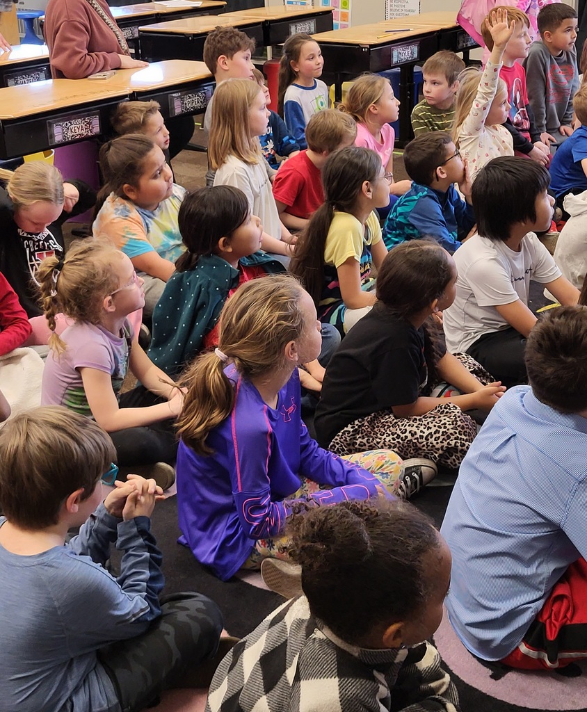 Children seated on the floor