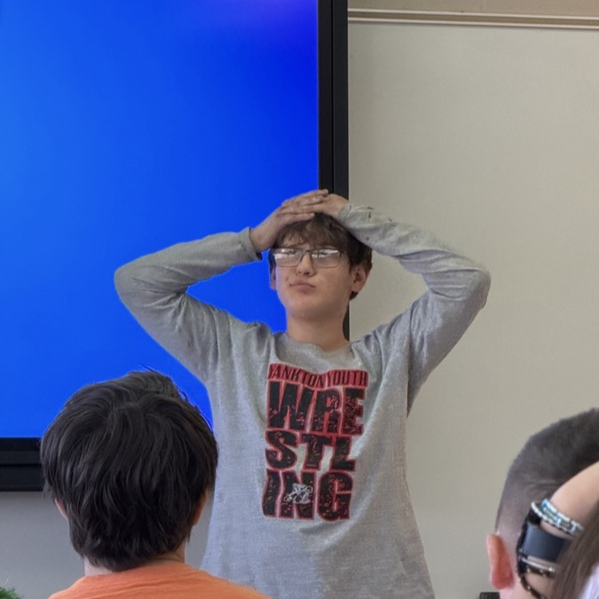 student acting out emotions