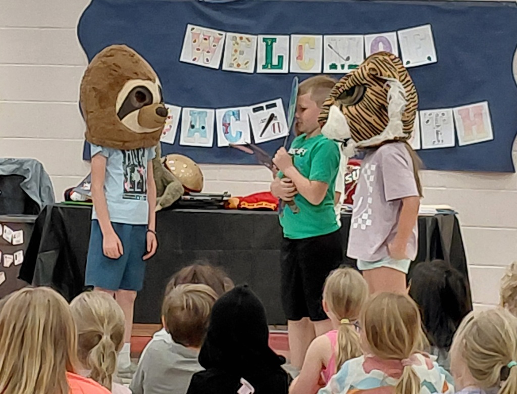 Kids in animal masks in play