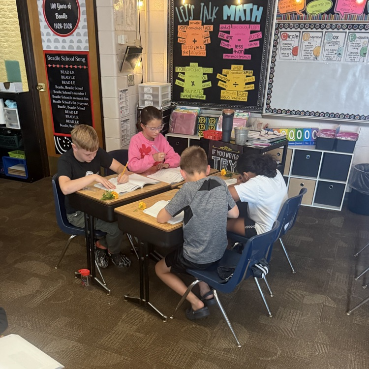 Beadle 4th graders in Mrs. Lukkes's class put on their science hats and got to investigate and observe marigolds. They sketched the plant parts. They explored their functions and had discussions with partners.