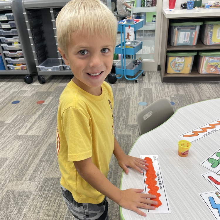 boy play dough art