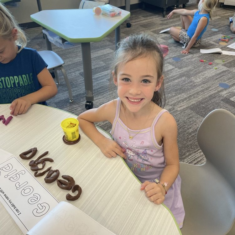 girl name with play dough 