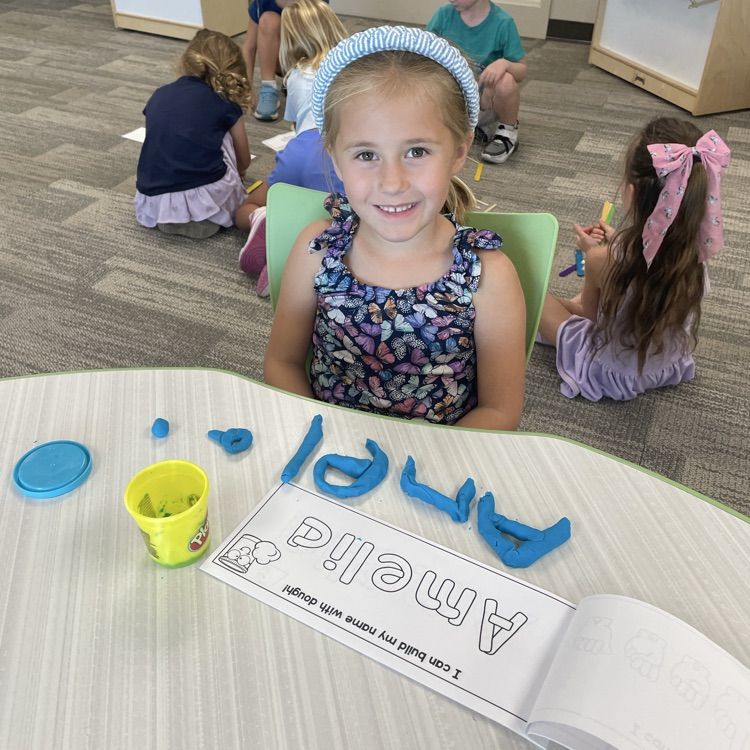 girl name with play dough 