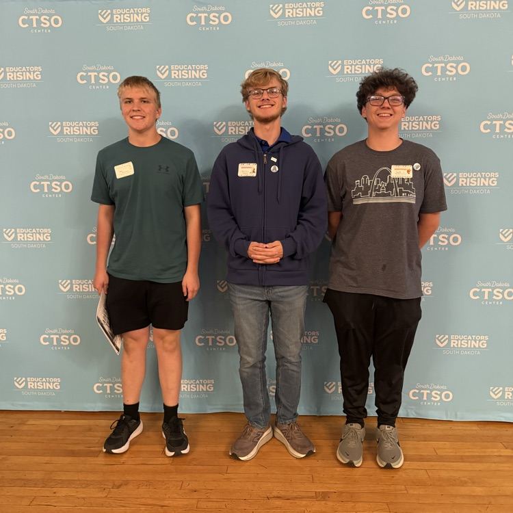 three students at Ed Rising conference
