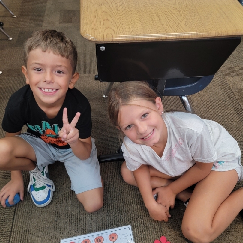 Students practicing math game.