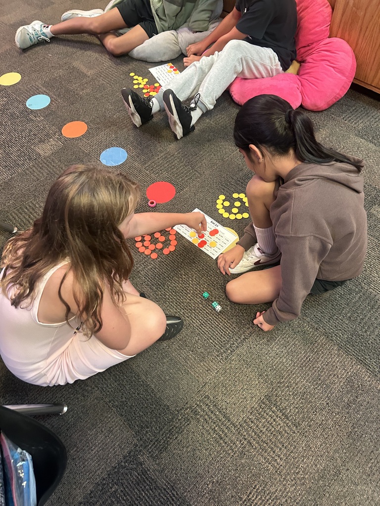 4th graders playing a math game