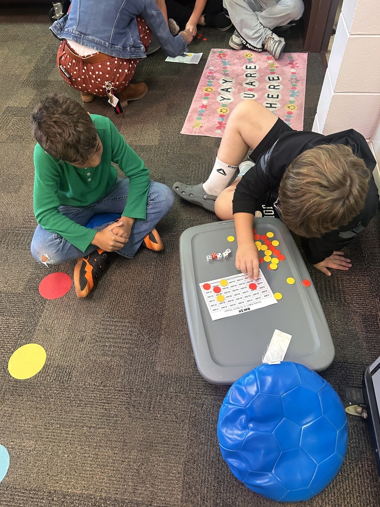 4th graders playing a math game