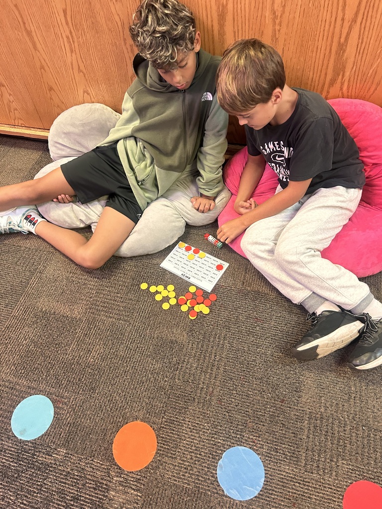 4th graders playing a math game