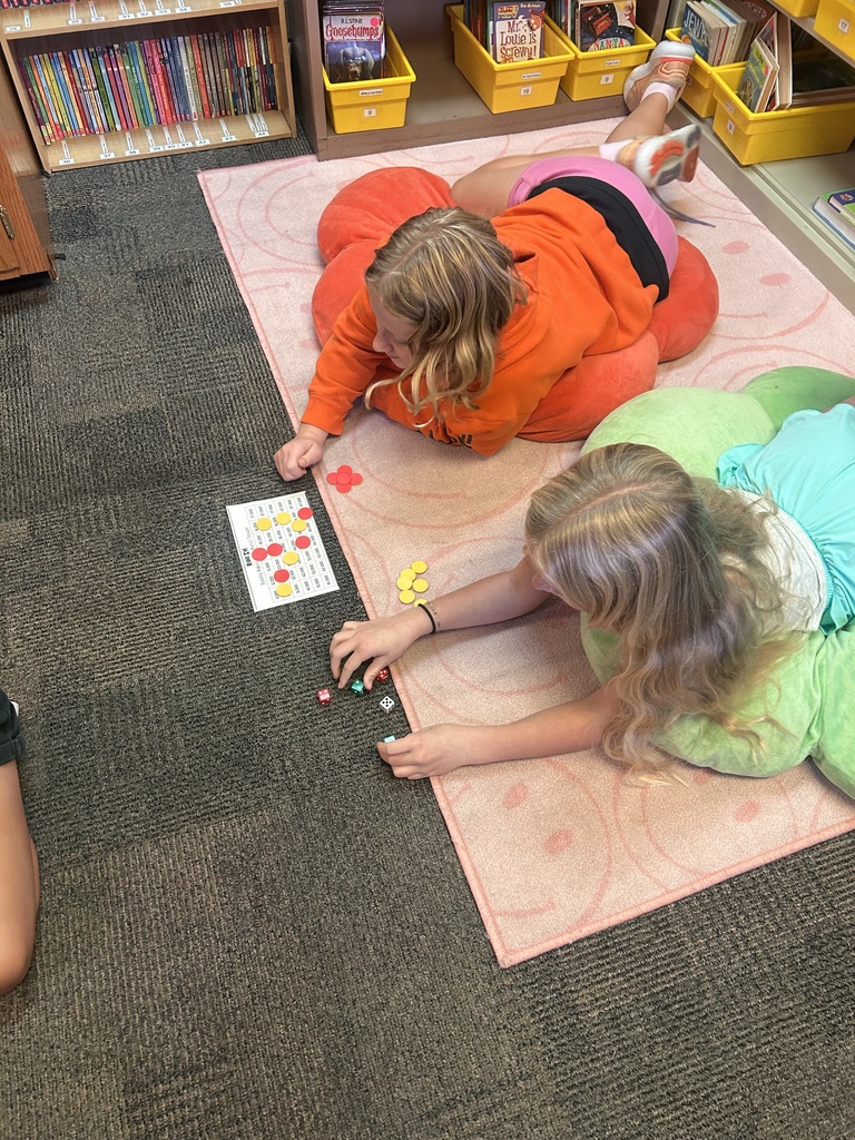 4th graders playing a math game