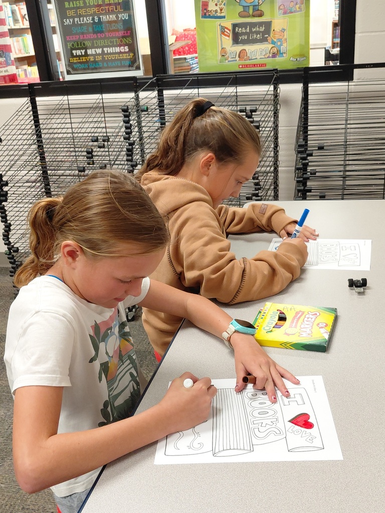 2 girls coloring