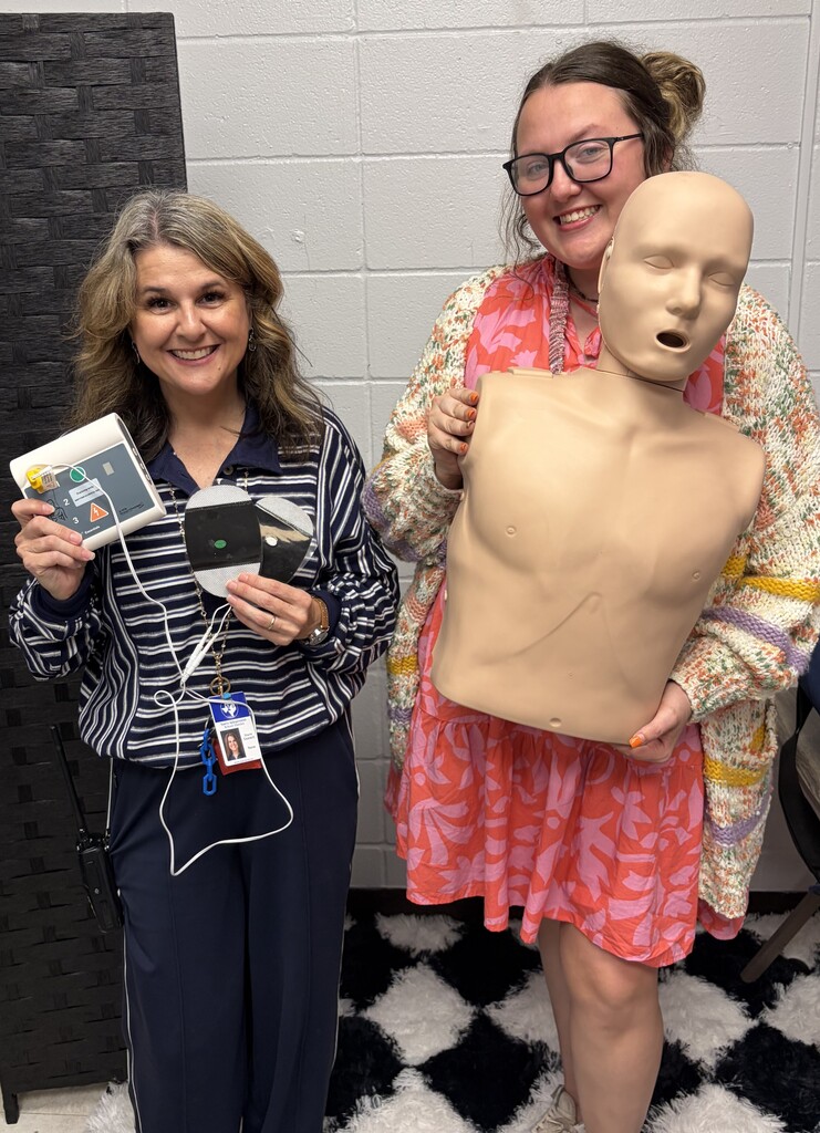 Nurse trainer and trainee for CPR