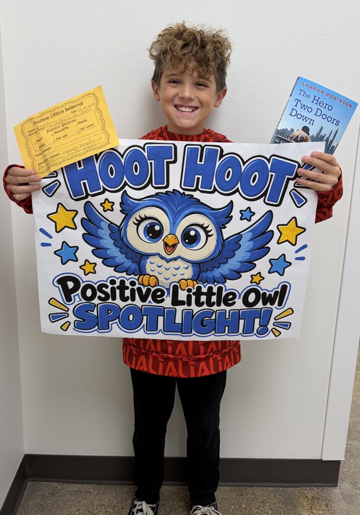 boy holding up Positive spotlight poster