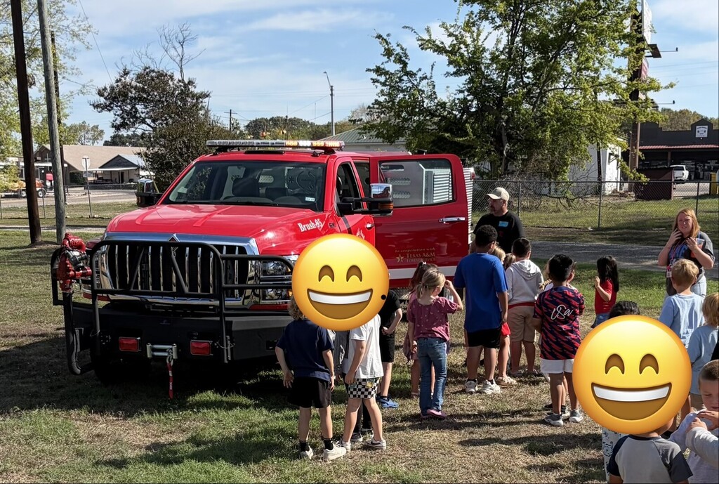 kids getting to look at a firetruck
