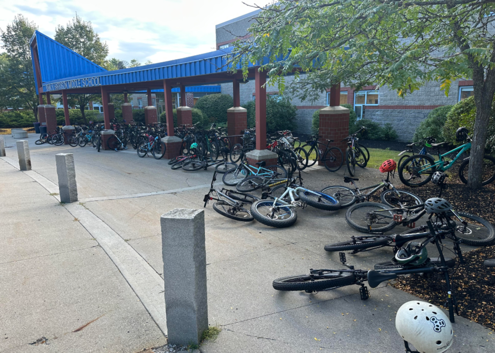 bicycles lines up outside school