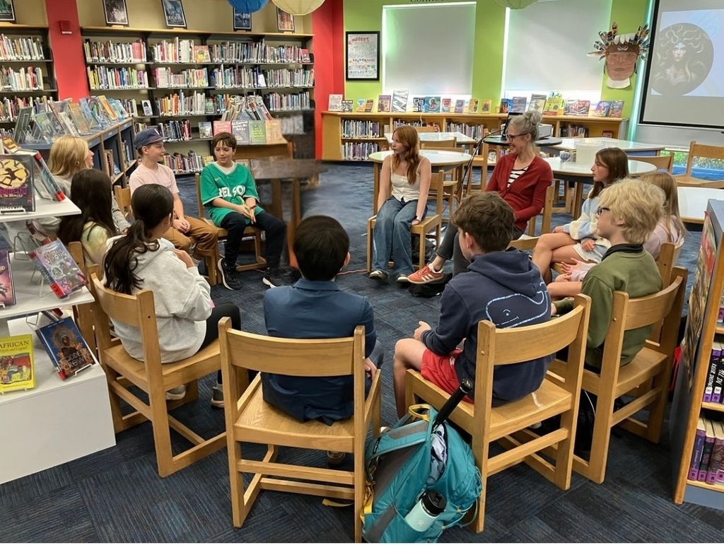 Ms. Burrows facilitating a small group discussion for One Book, One School