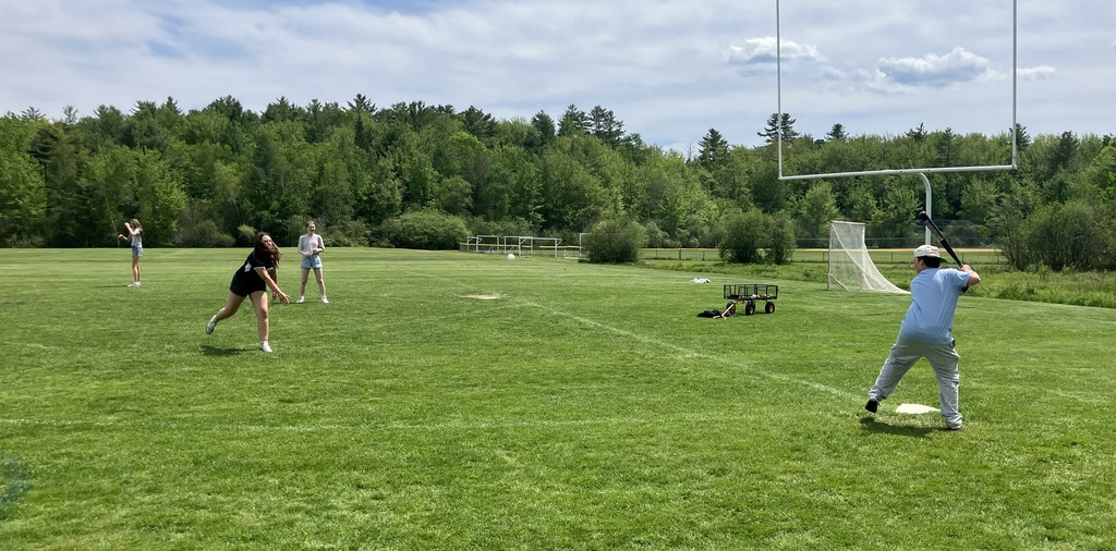 8th-grade PE students playing wiffleball
