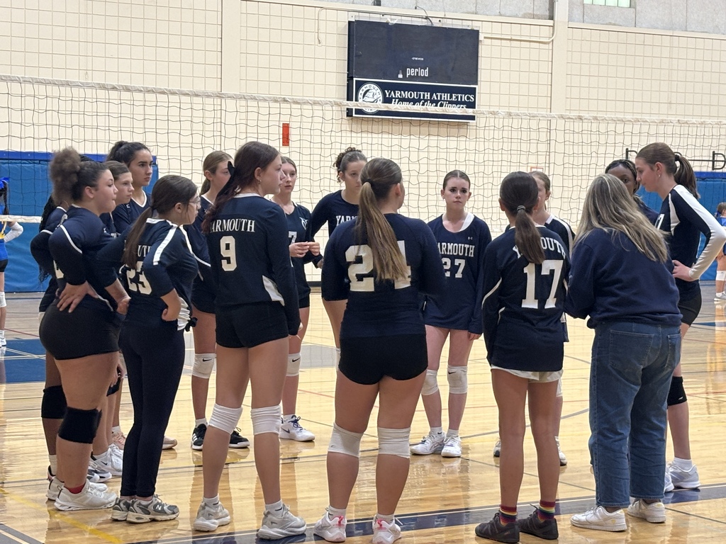 HMS 8th grade Volleyball Team during a timeout today against Falmouth