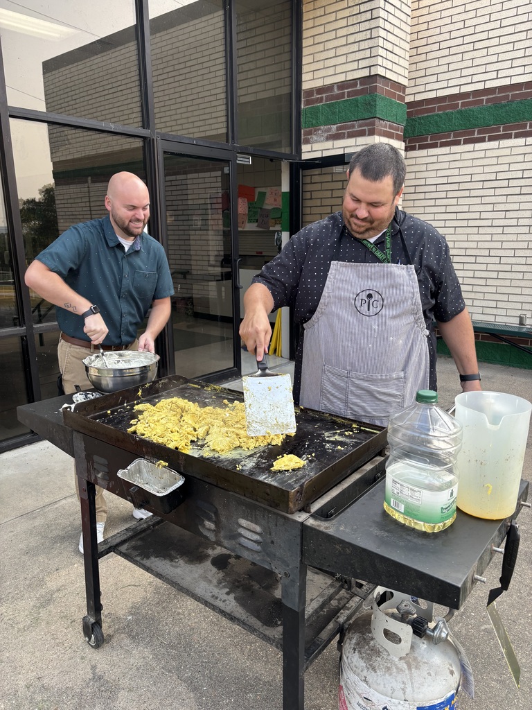 Principals cooking breakfast