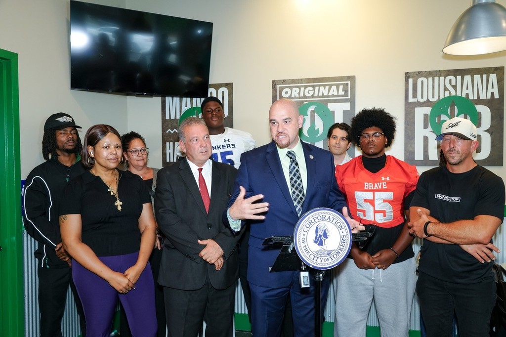 Superintendent Soler Speaking at the Wingstop Grand Opening 